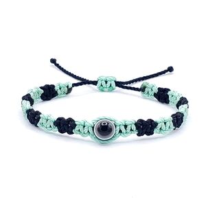 Teal and black evil eye bracelet, handmade braided bracelet, crochet bracelet